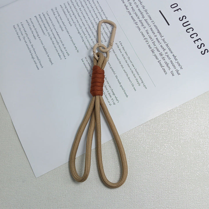 Versatile paracord utility keychain with strong carabiner for keys, tools & outdoor gear.
