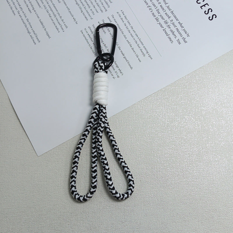 Outdoor paracord keychain holder, rugged & versatile for secure key management and travel.