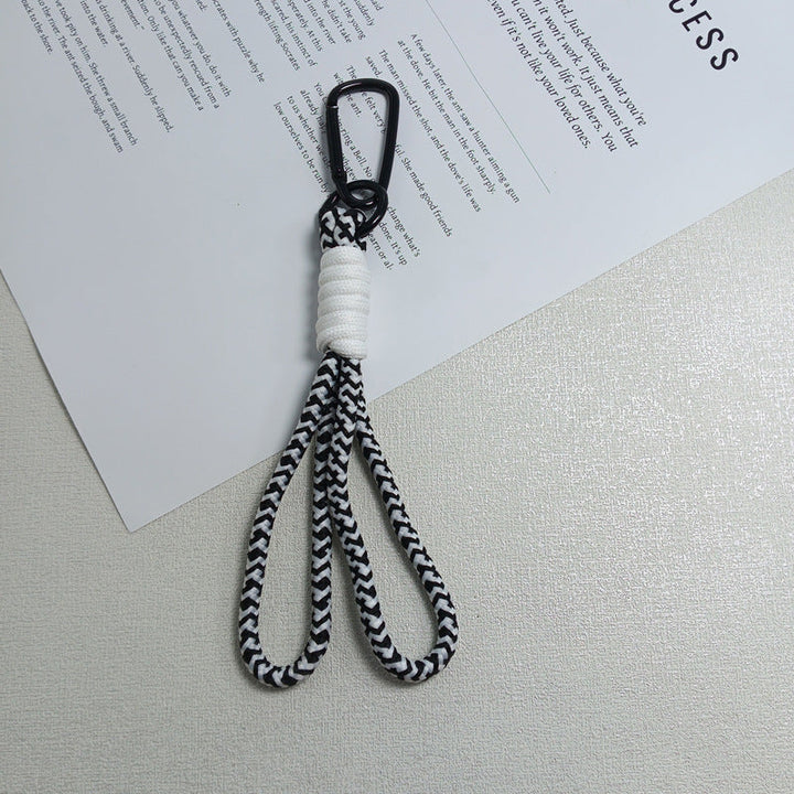 Outdoor paracord keychain holder, rugged & versatile for secure key management and travel.
