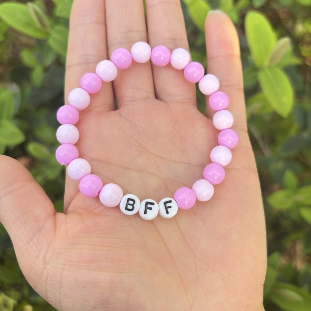 Giftable unisex pastel beaded bracelet with 'LOVE' letters. A fashionable friendship accessory.