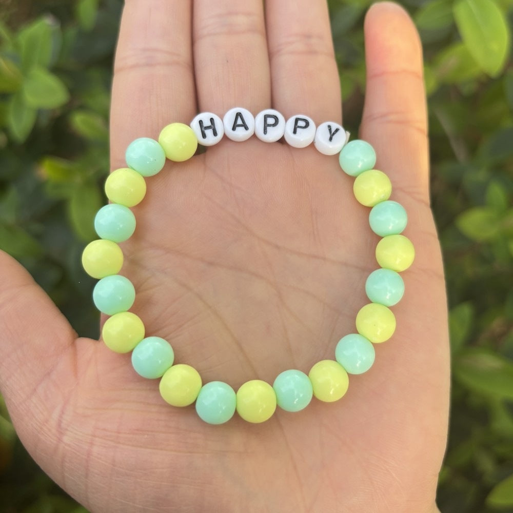 Thoughtful gift: Unisex pastel bead stretch bracelet with 'LOVE' letters. A symbol of friendship.