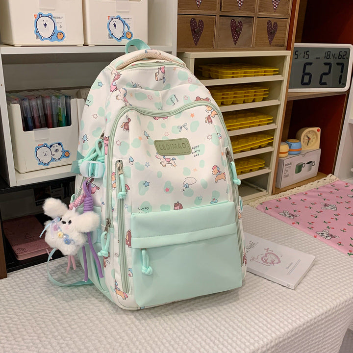 Cute animal print backpack for school, travel. Durable, vibrant cartoon fox graphic unisex bag. Playful accessory.