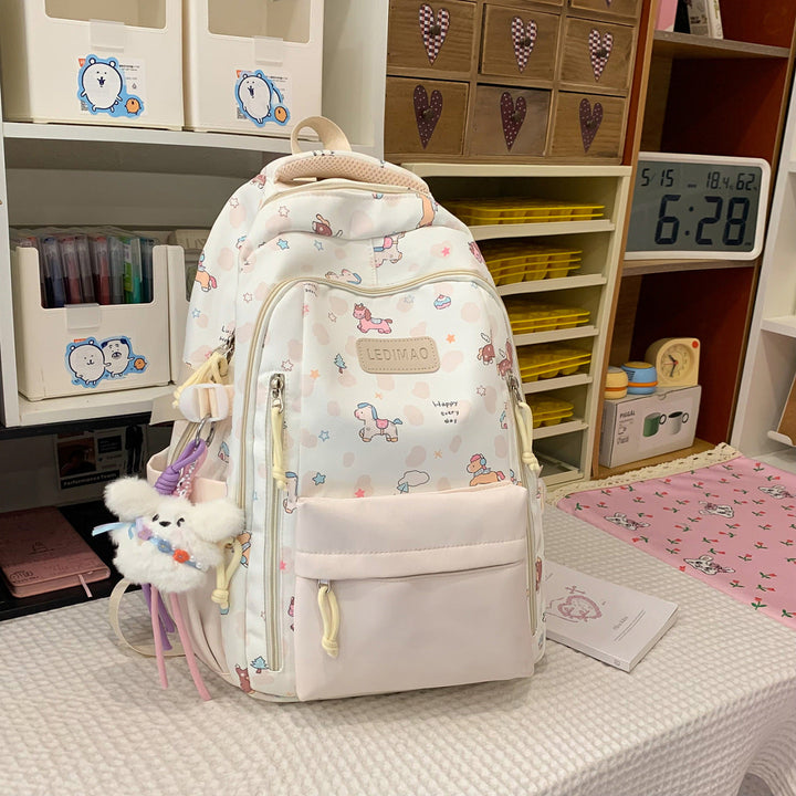 Durable school backpack with vibrant animal graphics. Playful unisex travel bag for students, ideal for daily use.