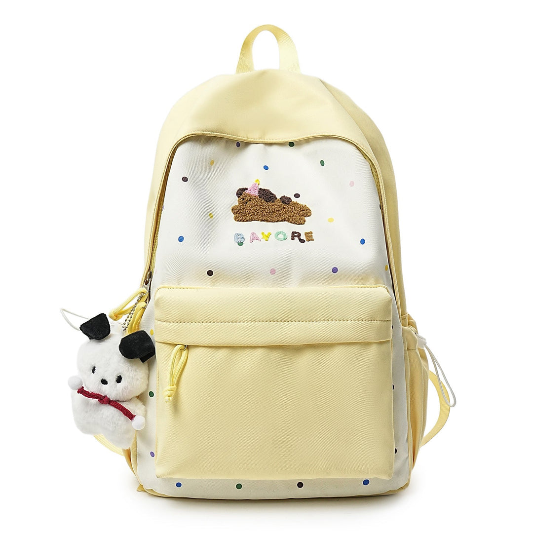 Colorful polka dot cartoon student backpack with a playful character design, ideal for school or casual daily use.