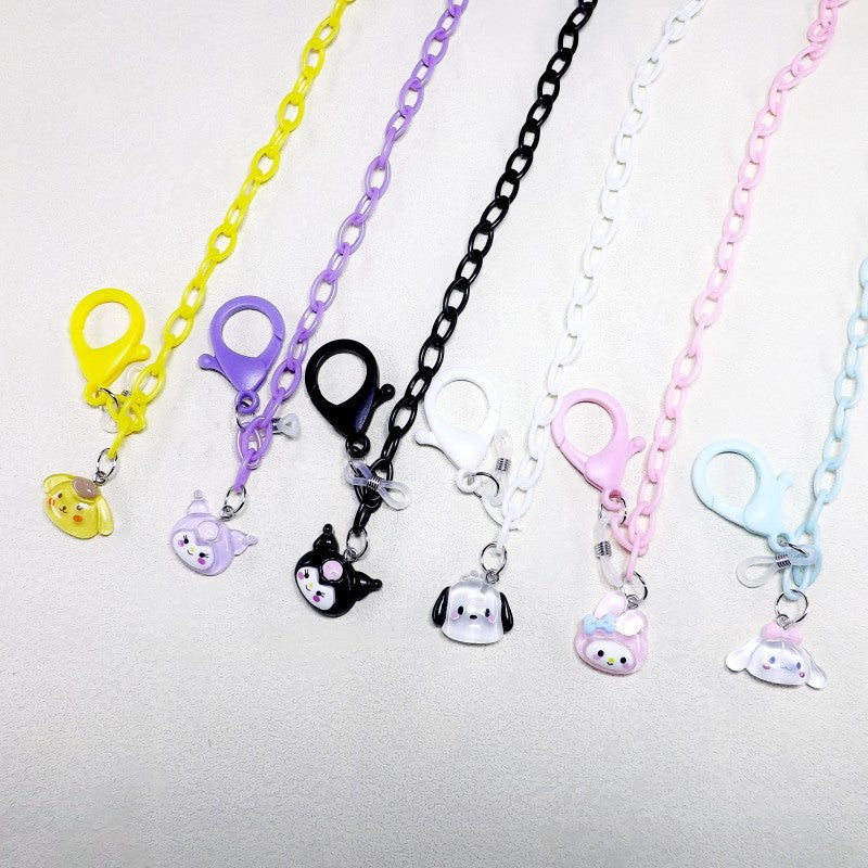 Unisex playful eyeglass holder chain with cute dog pendant; functional spectacle retainer in transparent material.