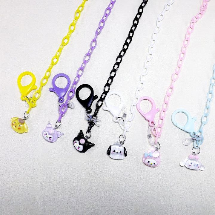Unisex playful eyeglass holder chain with cute dog pendant; functional spectacle retainer in transparent material.
