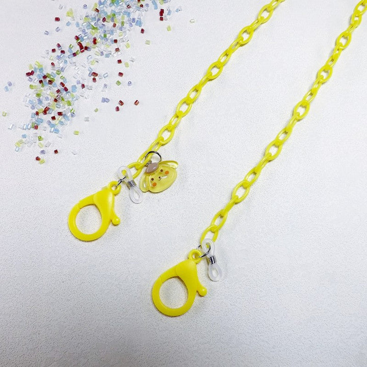 Fun and functional eyewear retainer: a clear eyeglass chain with an adorable dog pendant.