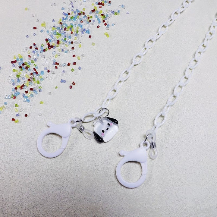 Modern transparent eyeglass holder chain with a charming dog pendant, perfect for playful style.