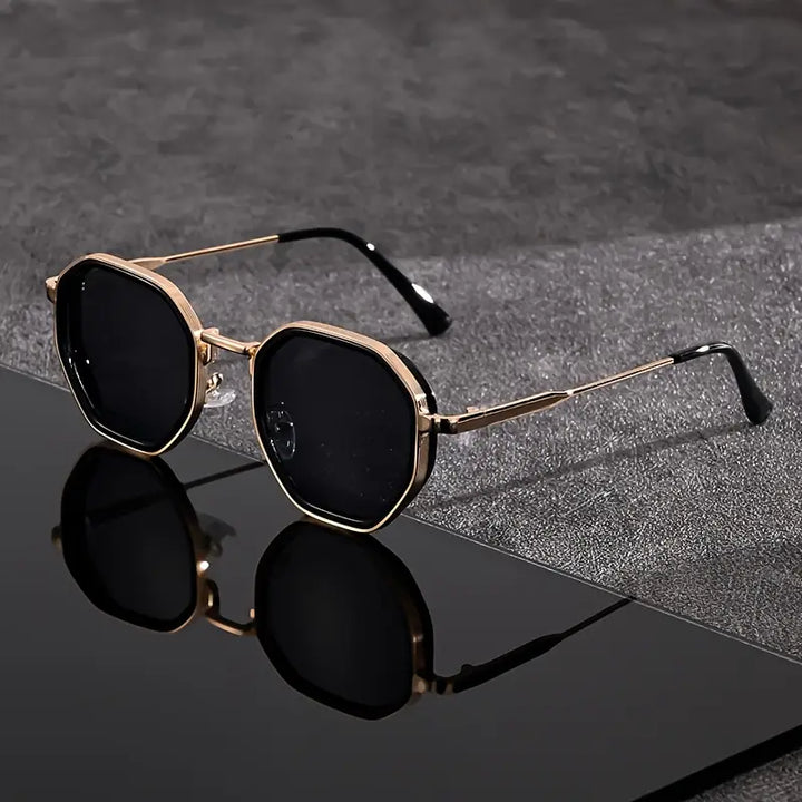 Stylish polygonal sunglasses with black/golden frames & blue/gray/tea tinted gradient lenses. Unisex fashion eyewear.