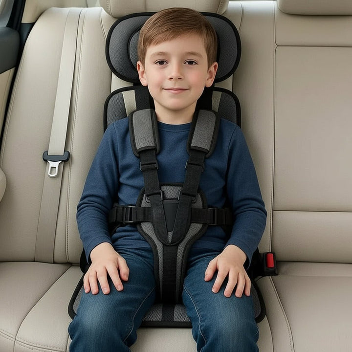 Child car seat securely installed in a vehicle, providing kids safety & comfort for everyday commutes & travel.
