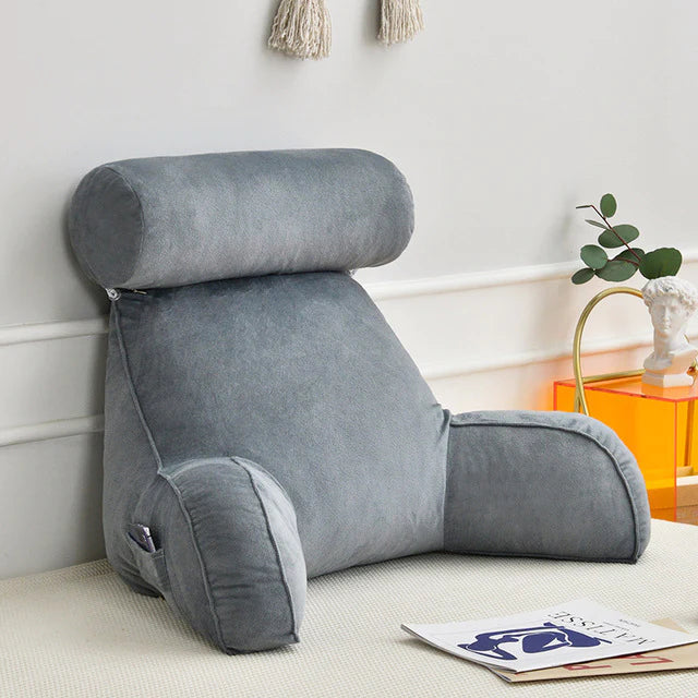 Unisex reading bed pillow with supportive arms & memory foam for ultimate back and arm support, perfect for lounging.