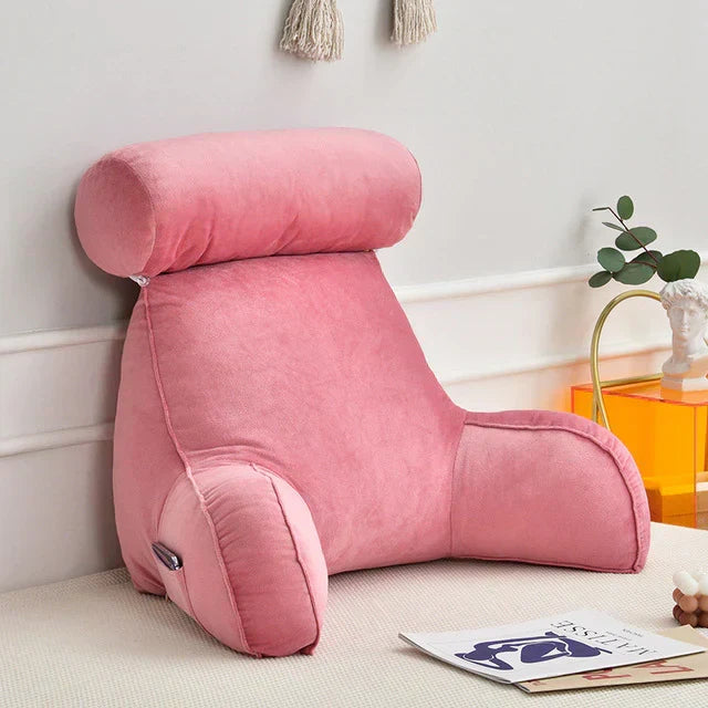 Ergonomic bedrest reading pillow with arm support, memory foam provides superior back comfort for lounging & relaxation.