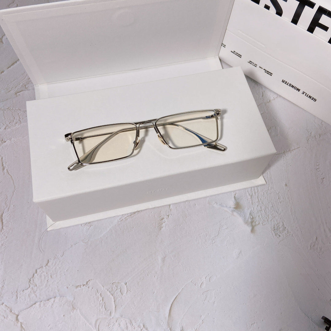 Trendy unisex rectangular metal frame sunglasses, UV400 protected for beach days.