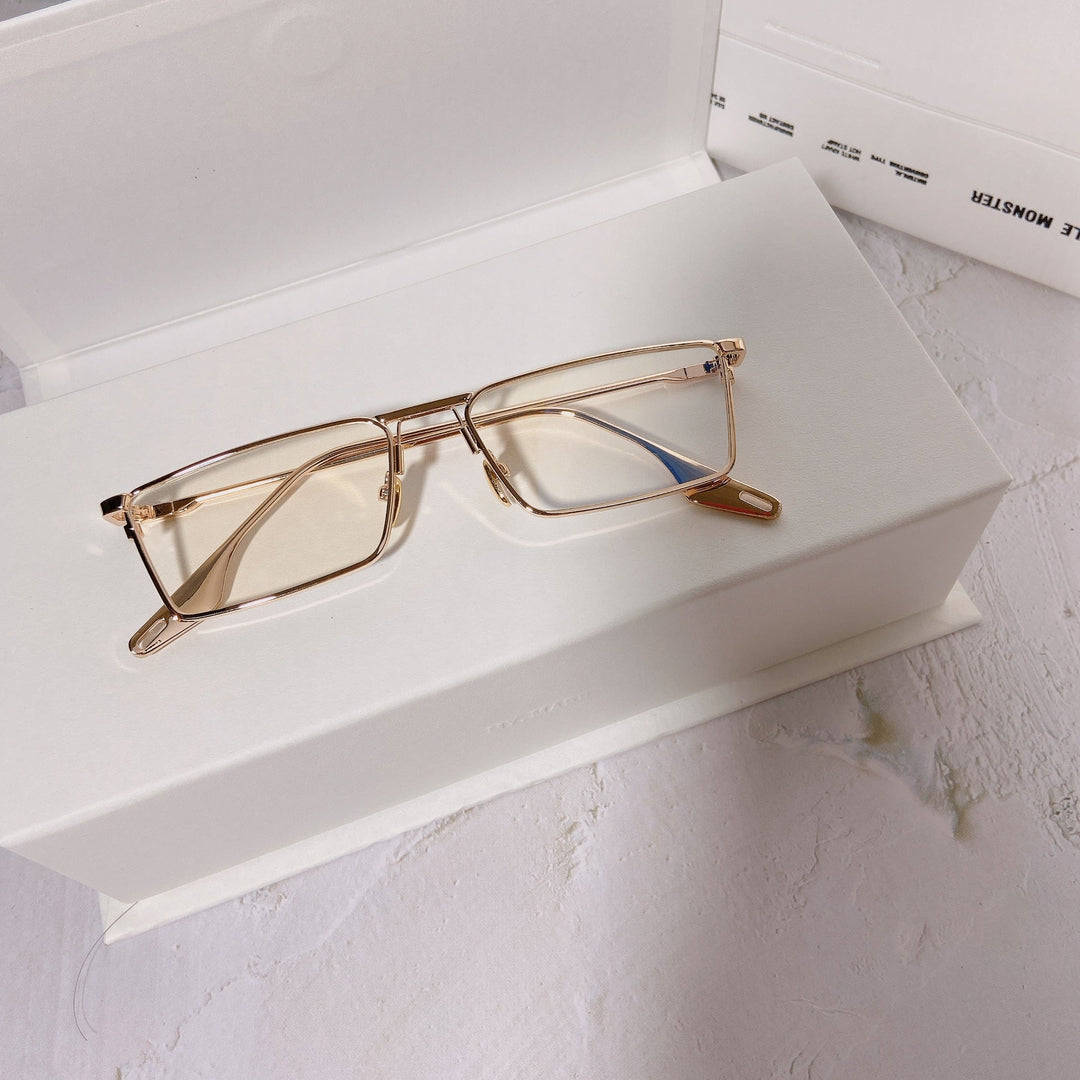 Modern unisex rectangular sunglasses with sleek metal frame and UV400 sun protection.