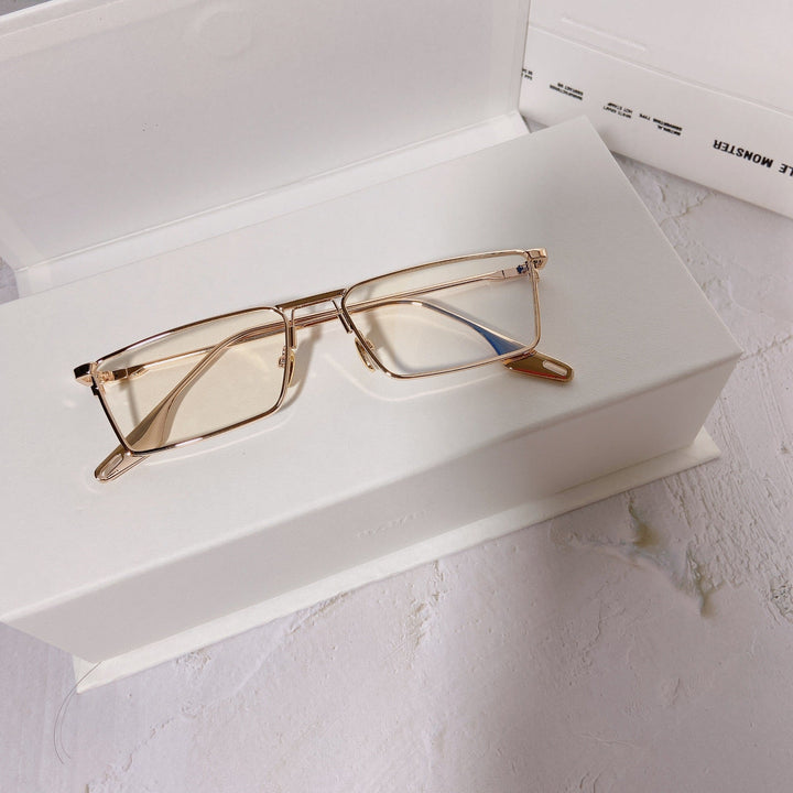 Modern unisex rectangular sunglasses with sleek metal frame and UV400 sun protection.