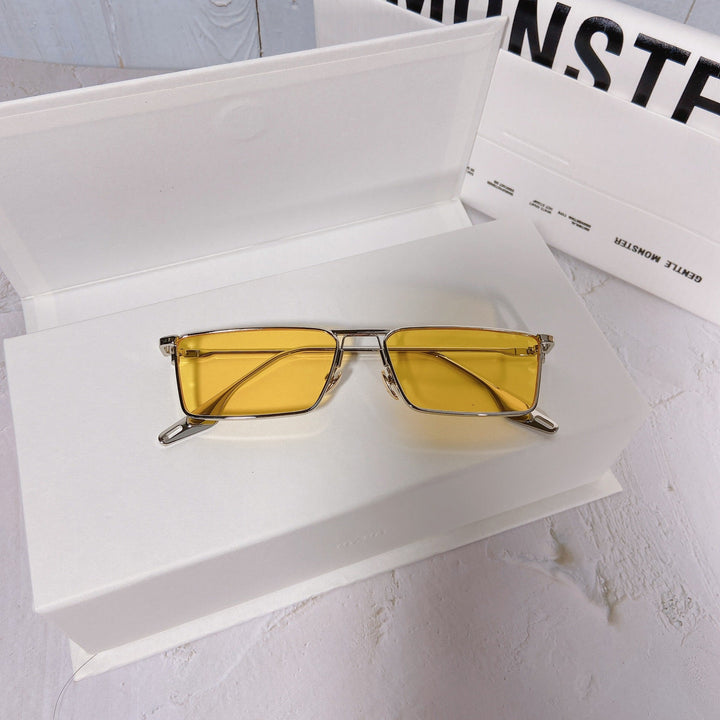 Durable metal frame unisex rectangular sunglasses, UV400 lenses for all-day sun protection.