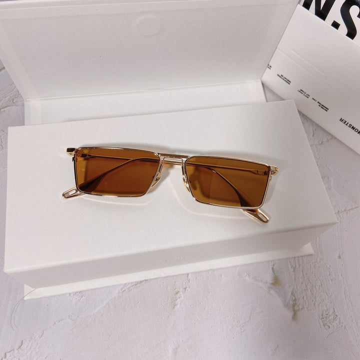 Unisex rectangular metal frame sunglasses, UV400 protected for sunny outdoor adventures.