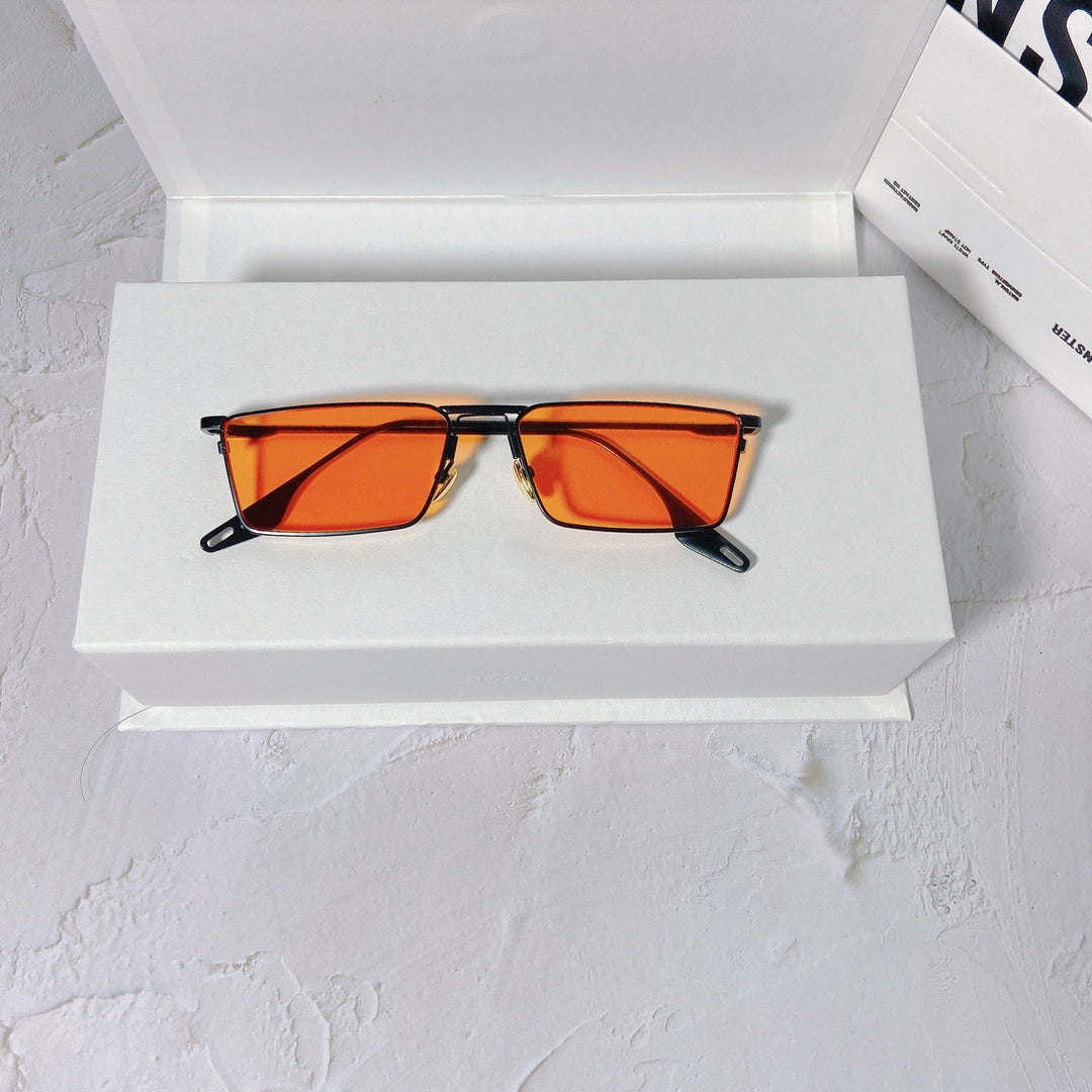 Elegant unisex rectangular metal frame sunglasses, UV400 protection, a modern eyewear choice.