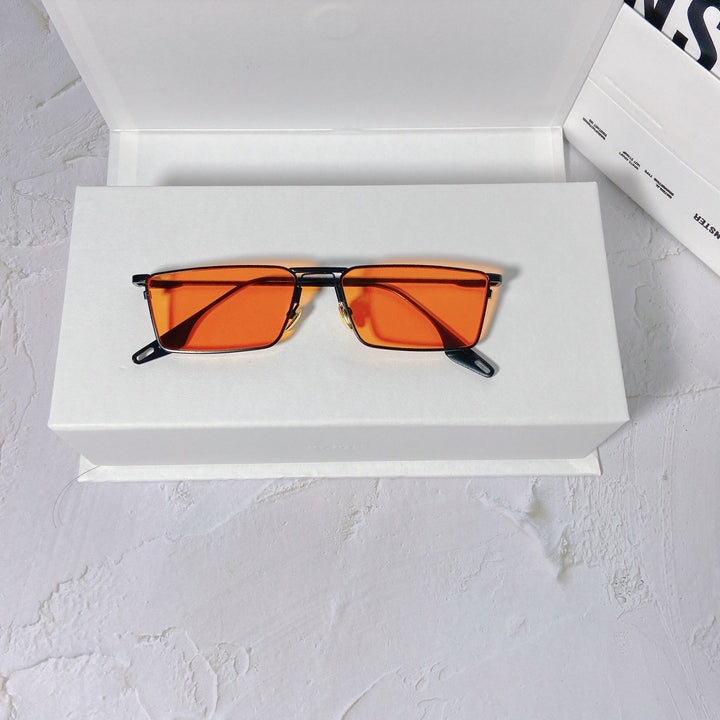 Elegant unisex rectangular metal frame sunglasses, UV400 protection, a modern eyewear choice.
