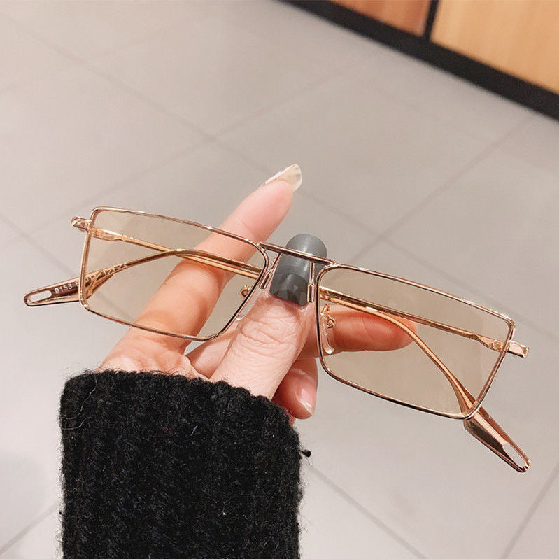 Lightweight unisex rectangular sunglasses for comfortable all-day wear, essential travel eyewear.