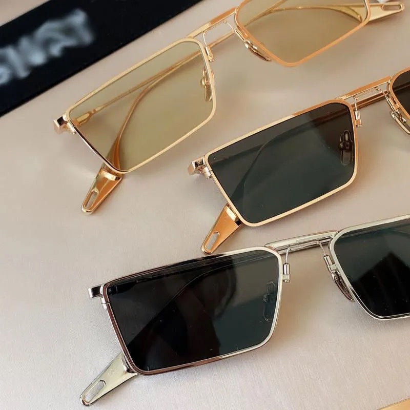 Stylish rectangular shades, ideal summer accessory for outdoor wear & UV eye protection.