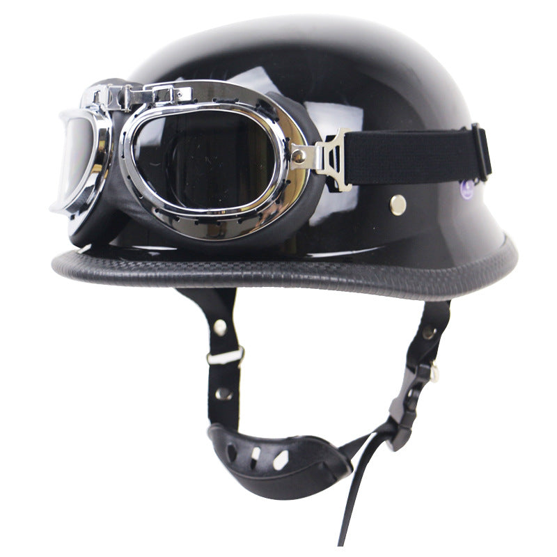 Unisex retro black half-helmet motorcycle with aviator goggles. Essential vintage rider protective gear.