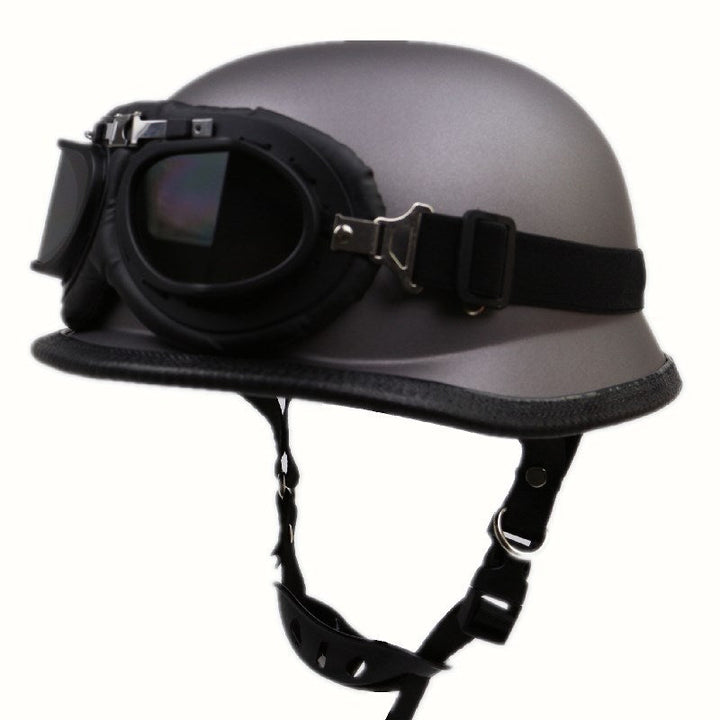 Durable protective half-helmet motorcycle with goggles, essential safety gear for cruiser riders.