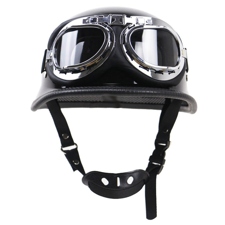 Adjustable strap & quick-release buckle on a retro half-helmet motorcycle, ensuring secure fit.