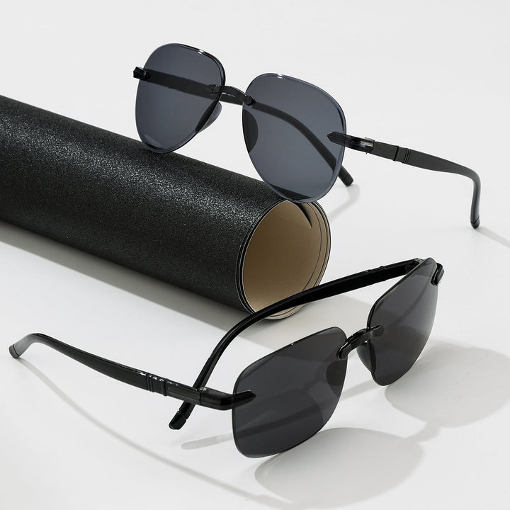 Stylish geometric black retro sunglasses offering UV eye protection. Unisex fashion statement.