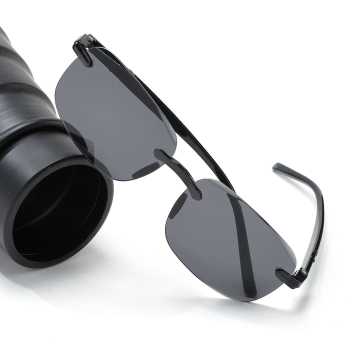 Modern geometric UV protection sunglasses, black retro design. Unisex eye protection eyewear.