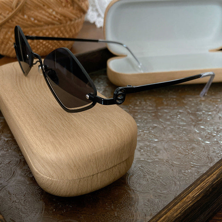 Fashionable geometric retro sunglasses, modern unisex eyewear for stylish looks.