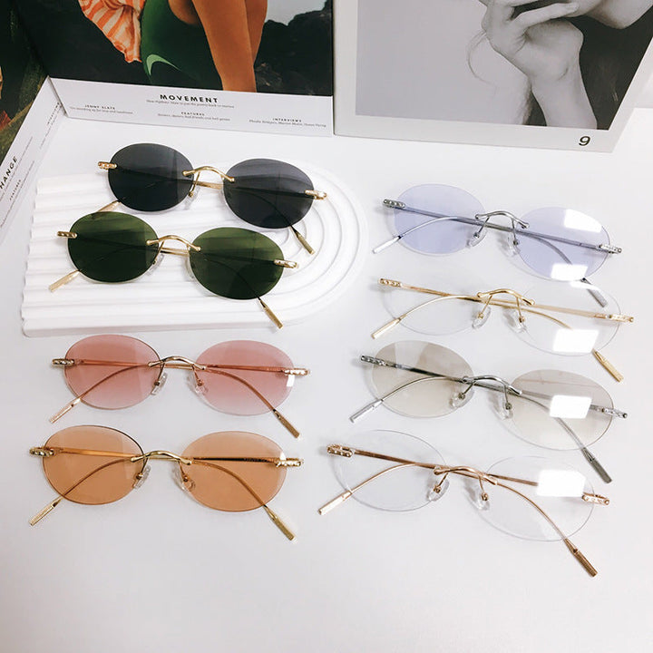 Lightweight retro oval sunglasses for men & women, offering full UV protection eyewear.