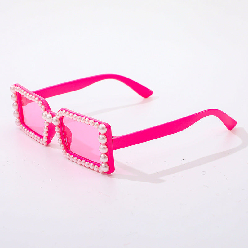 Stylish pearl embellished retro square sunglasses for men and women, providing UV protection.