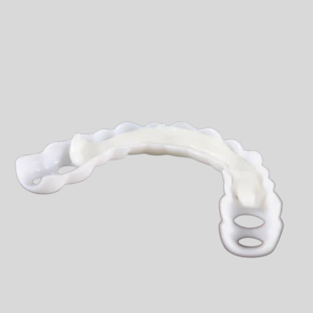 Close-up of unisex snap-on smile veneers, providing an instant, temporary, and reusable solution for a perfect smile.