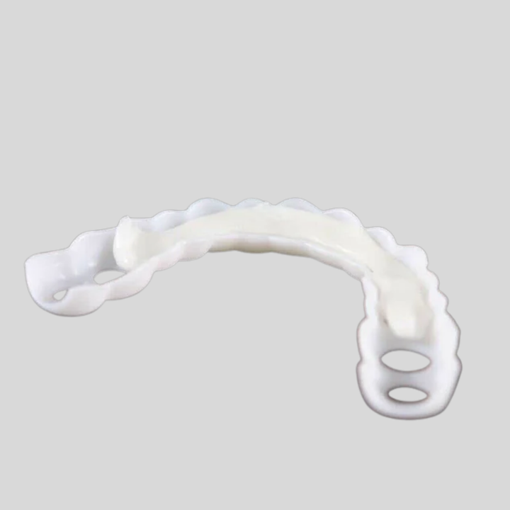 Close-up of unisex snap-on smile veneers, providing an instant, temporary, and reusable solution for a perfect smile.