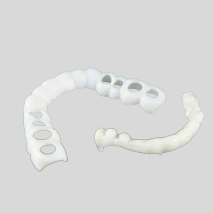 Reusable snap-on dental cover veneers for instant smile enhancement. A temporary, pain-free whitening alternative.