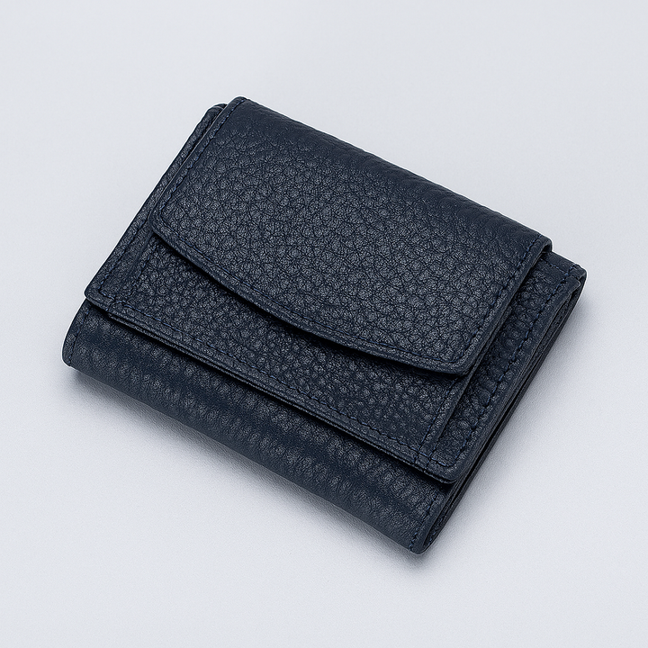 Unisex RFID-blocking genuine leather wallet, handmade for everyday carry. Slim minimalist design, secure.