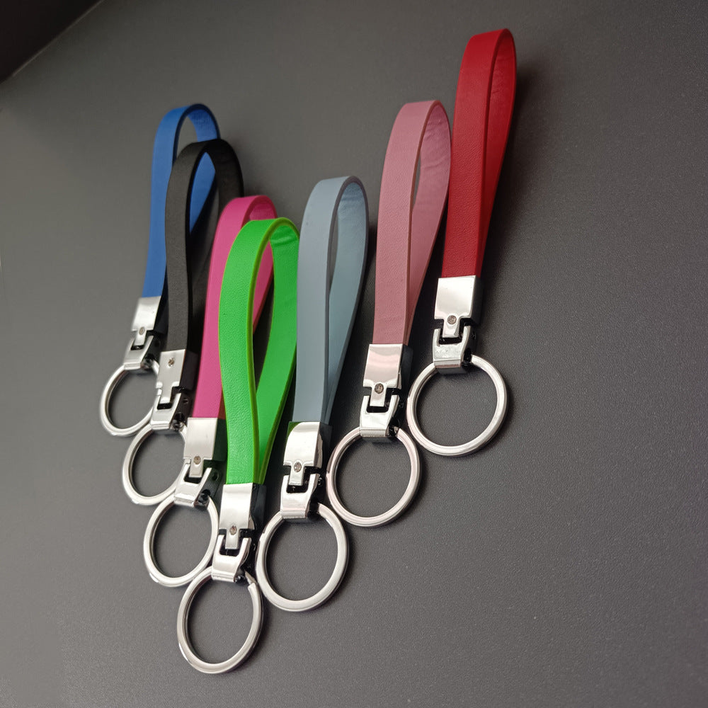 Unisex slim leather keyring, elegant key holder crafted from premium durable leather.