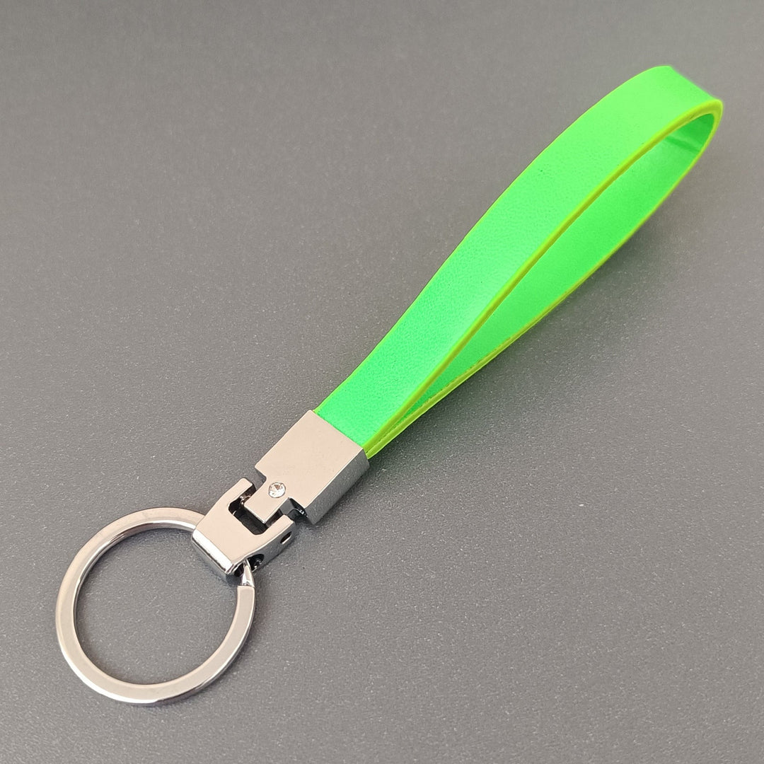 High-quality slim leather keyring from a side angle, emphasizing its durable and compact design.