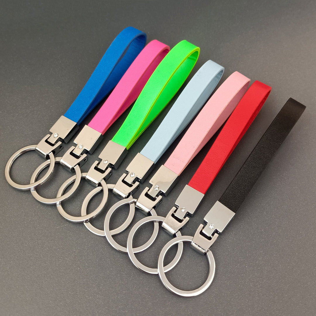 Vibrant colorful slim leather key holder, a fashionable and durable unisex keyring accessory.