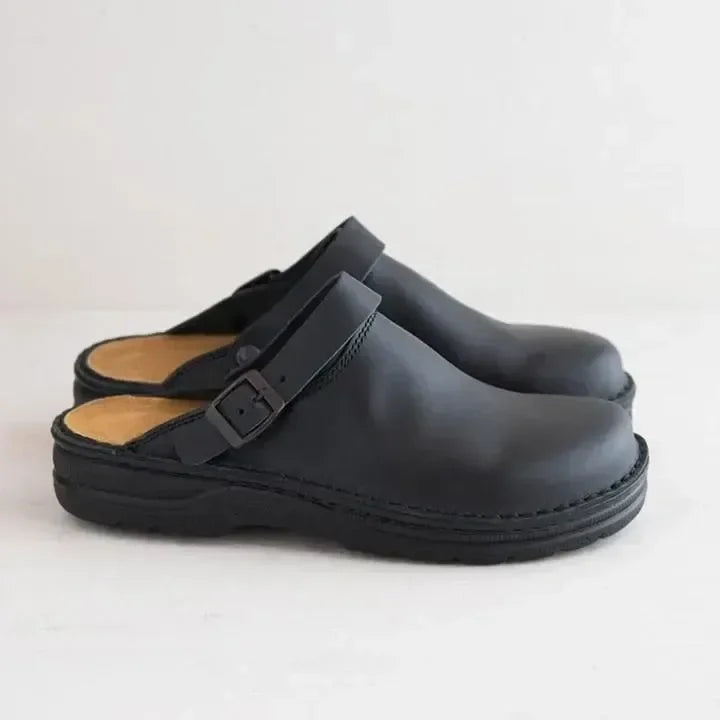 Navy unisex clogs, providing exceptional orthopedic support and comfort, perfect for long days.