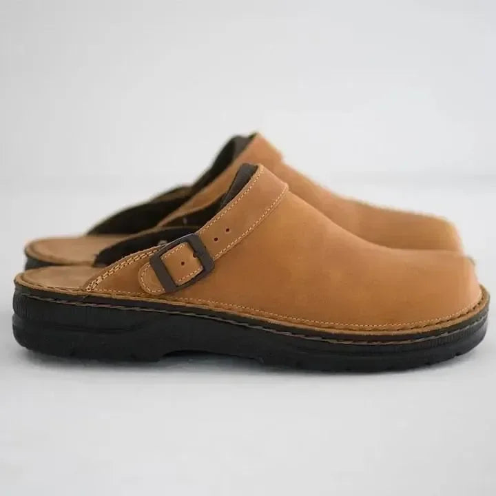 Classic slip-on comfort clogs with orthopedic arch support, great for unisex casual or work footwear.