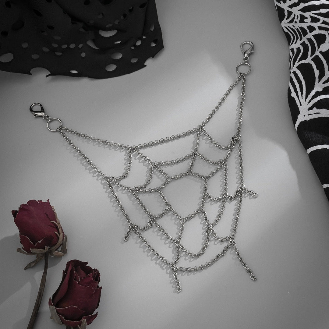 Trendy spiderweb chain accessory for pants, a unique unisex statement piece for edgy punk style.