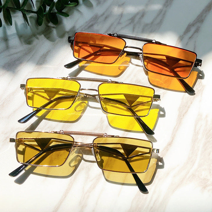 Stylish unisex square sunglasses with mirrored lenses & adjustable nose pads. Fashionable eye protection.
