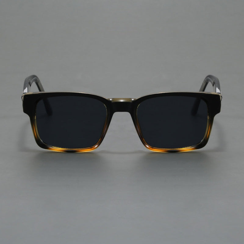 Durable unisex sunglasses with UV400 protection, squared shape, anti-glare lenses & metal hinges.