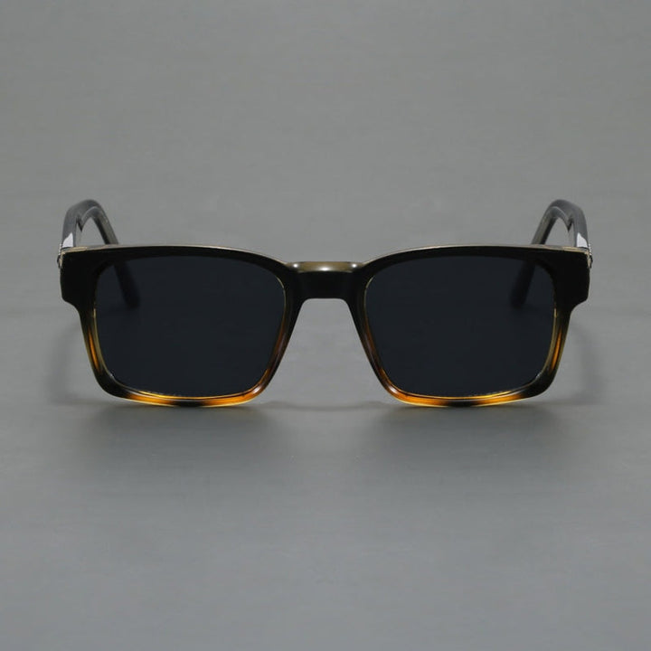 Durable unisex sunglasses with UV400 protection, squared shape, anti-glare lenses & metal hinges.