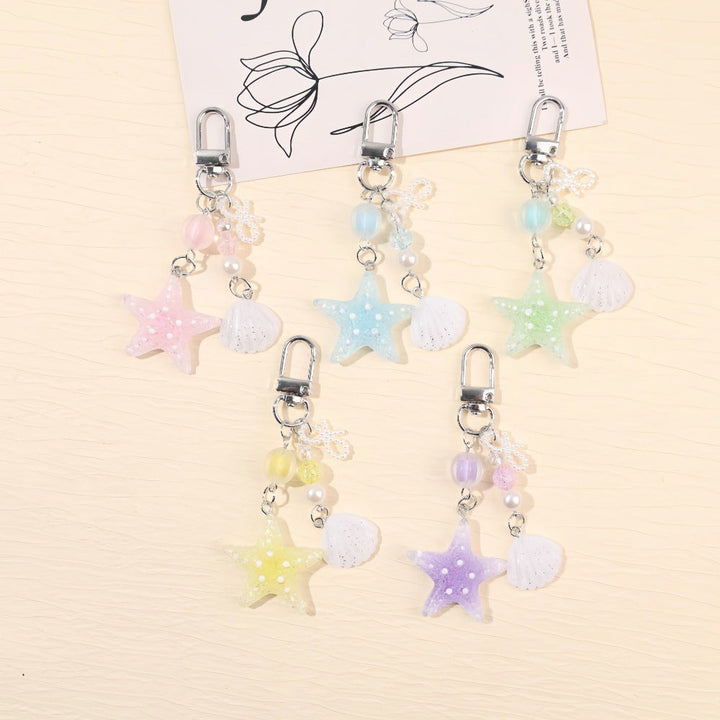 Unisex star maritime keychain with sparkling accents, perfect as a bag charm or gift accessory.