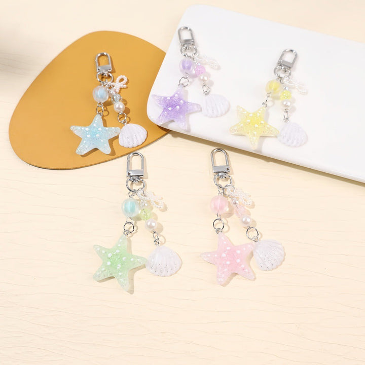 Glittering star maritime keychain, a stylish unisex accessory with sparkling resin details.