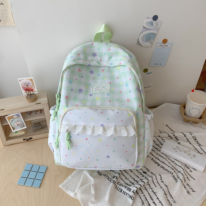 Unisex star print backpack, ideal for school or travel. Stylish, colorful, and durable daily carry bag.