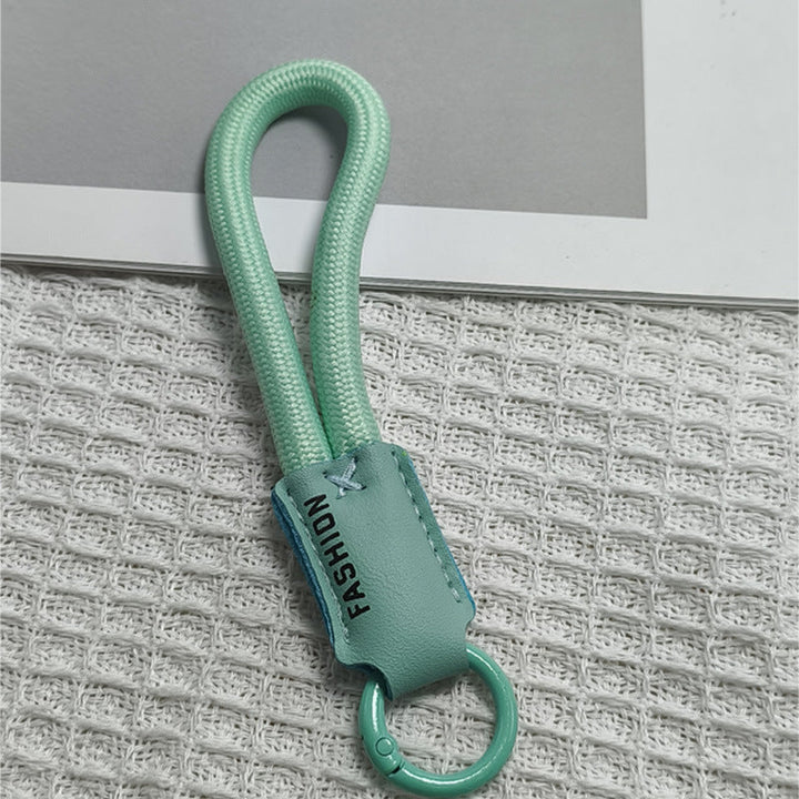 Versatile unisex key chain holder, perfect as a bag charm or key organizer.